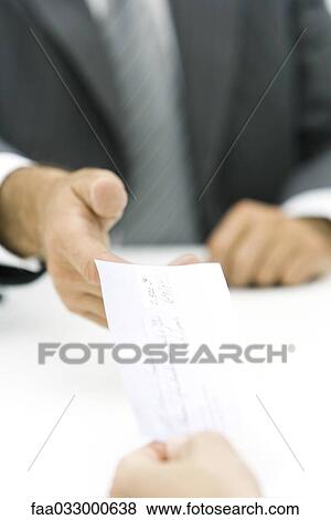 Stock Photo - Businessman accepting check, cropped view of hands. Fotosearch