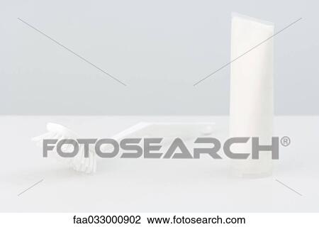 Cleaning brush and tube on table View Large Photo Image Stock Image - Cleaning brush and tube on table. Fotosearch