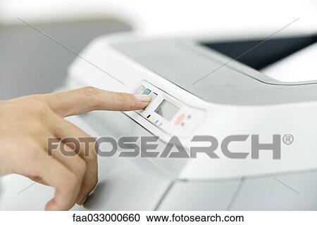 Hand pushing button on printer, close-up View Large Photo Image Stock Image - Hand pushing button on printer, close-up. Fotosearch
