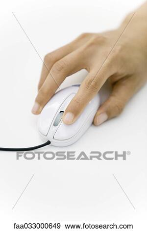 Stock Photo - Hand using computer mouse, close-up. Fotosearch