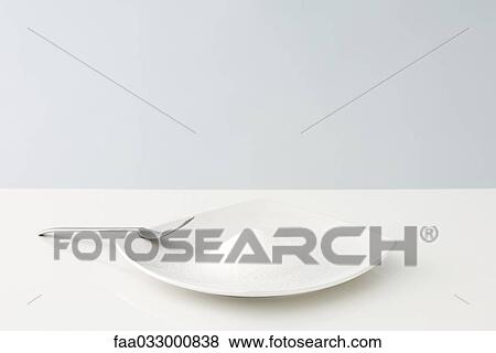 Heap of sugar on plate, fork resting on edge of plate View Large Photo Image Stock Photo - Heap of sugar on plate, fork resting on edge of plate. Fotosearch