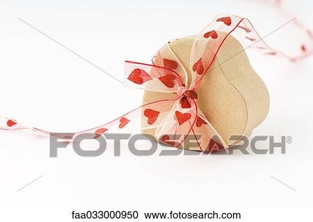 Stock Image - Heart shaped box with heart ribbon. Fotosearch