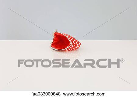 Open and empty coin purse View Large Photo Image Stock Photo - Open and empty coin purse. Fotosearch