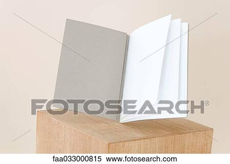 Open book balancing on pedestal, blank pages, close-up View Large Photo Image Stock Photography - Open book balancing on pedestal, blank pages, close-up. Fotosearch