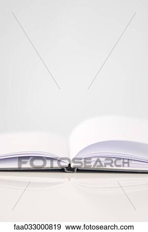 Stock Photo - Open book with blank pages, close-up. Fotosearch