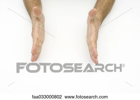 Open palms facing each other, cropped view View Large Photo Image Stock Image - Open palms facing each other, cropped view. Fotosearch