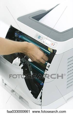 Person fixing paper jam in printer, cropped view View Large Photo Image Stock Image - Person fixing paper jam in printer, cropped view. Fotosearch