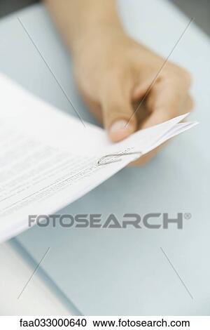 Person reading document, cropped view of hand View Large Photo Image Stock Image - Person reading document, cropped view of hand. Fotosearch