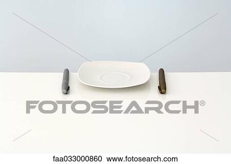 Plate with pens on either side instead of silverware View Large Photo Image Stock Image - Plate with pens on either side instead of silverware. Fotosearch