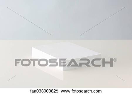 Stack of blank paper resting on table View Large Photo Image Stock Photography - Stack of blank paper resting on table. Fotosearch
