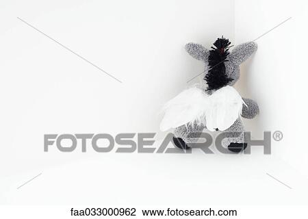 Stuffed elephant toy with wings, in the corner View Large Photo Image Stock Image - Stuffed elephant toy with wings, in the corner. Fotosearch