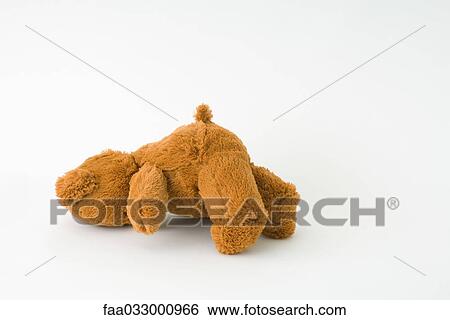 teddy bear lying down