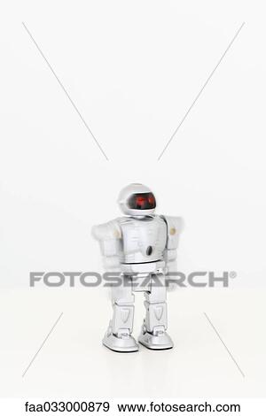 Stock Photo - Toy robot walking, blurred motion. Fotosearch