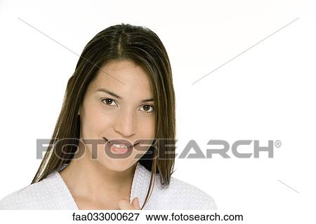 Woman smiling at camera, portrait View Large Photo Image Stock Photo - Woman smiling at camera, portrait. Fotosearch