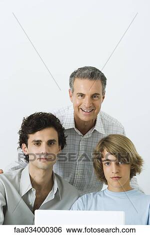 Mature father and two sons, portrait View Large Photo Image Stock Photograph - Mature father and two sons, portrait. Fotosearch