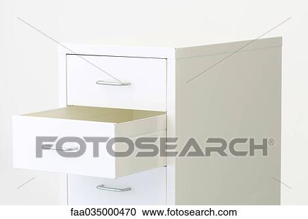 Chest of drawers, one drawer open View Large Photo Image Stock Image - Chest of drawers, one drawer open. Fotosearch