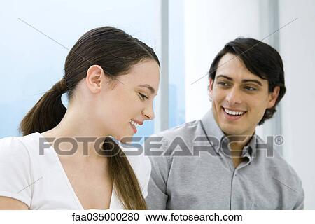 Couple smiling, portrait View Large Photo Image Stock Image - Couple smiling, portrait. Fotosearch