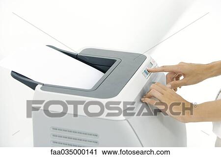 Hands pushing button on printer, cropped view View Large Photo Image Stock Image - Hands pushing button on printer, cropped view. Fotosearch