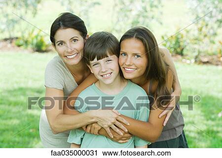 Mother with son and teen daughter, smiling at camera, portrait View Large Photo Image Stock Image - Mother with son and teen daughter, smiling at camera, portrait. Fotosearch