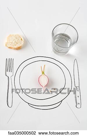 Stock Image - Place setting with half a radish and a small piece of bread. Fotosearch