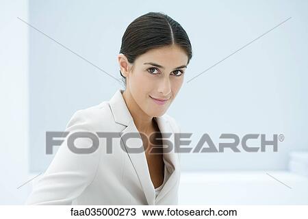 Professional woman smiling at camera, portrait View Large Photo Image Stock Image - Professional woman smiling at camera, portrait. Fotosearch