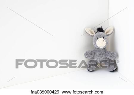 Stuffed donkey in the corner View Large Photo Image Stock Photo - Stuffed donkey in the corner. Fotosearch