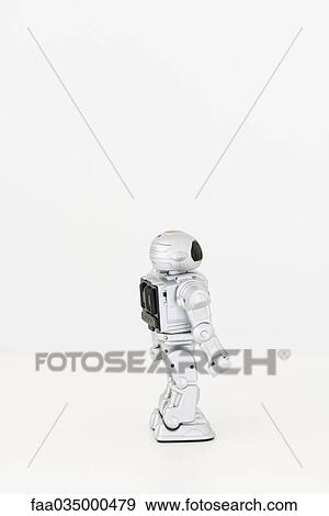 Toy robot, side view View Large Photo Image Stock Photo - Toy robot, side view. Fotosearch