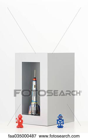 Toy robots and toy rocket View Large Photo Image Stock Photo - Toy robots and toy rocket. Fotosearch
