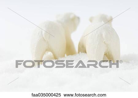Two toy polar bears walking in snow, rear view View Large Photo Image Stock Photography - Two toy polar bears walking in snow, rear view. Fotosearch