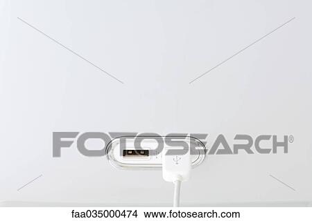 USB cable connected to USB port View Large Photo Image Picture - USB cable connected to USB port. Fotosearch