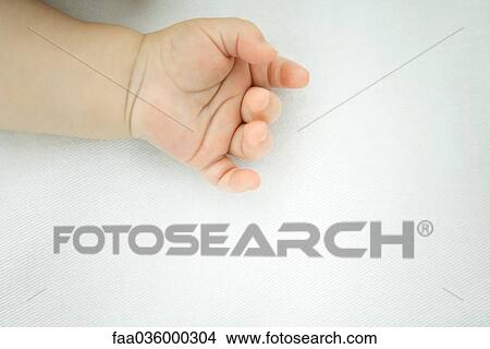 Baby's hand, close-up View Large Photo Image Picture - Baby's hand, close-up. Fotosearch
