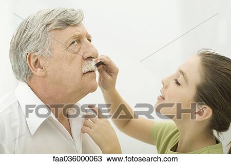 Grandfather patiently allowing granddaughter to groom his mustache, side view View Large Photo Image Stock Image - Grandfather patiently allowing granddaughter to groom his mustache, side view. Fotosearch