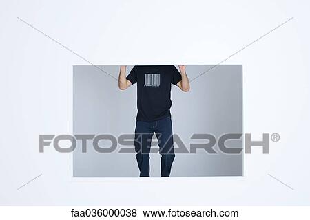 Man wearing tee-shirt printed with bar code, cropped View Large Photo Image Stock Photo - Man wearing tee-shirt printed with bar code, cropped. Fotosearch