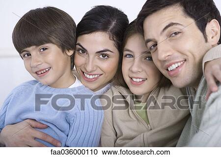 Portrait of family with two children, close-up View Large Photo Image Stock Image - Portrait of family with two children, close-up. Fotosearch