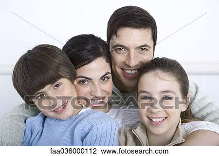Portrait of family with two children, close-up View Large Photo Image Stock Image - Portrait of family with two children, close-up. Fotosearch