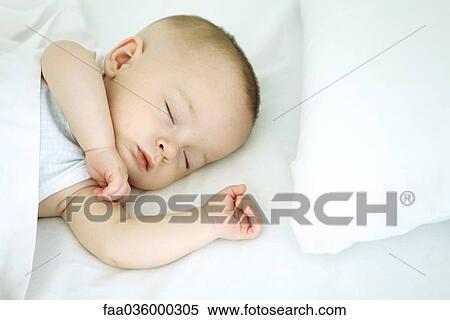 Stock Photography - Sleeping baby, close-up. Fotosearch