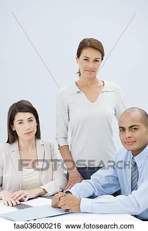 Team of professionals looking at camera, portrait View Large Photo Image Stock Photograph - Team of professionals looking at camera, portrait. Fotosearch