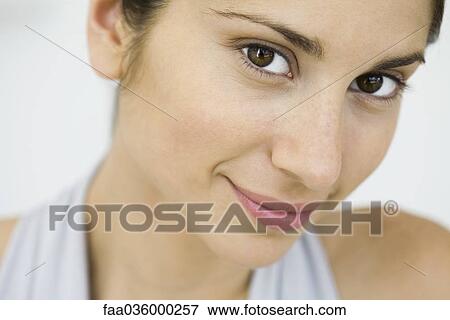 Woman smiling at camera, portrait View Large Photo Image Stock Photo - Woman smiling at camera, portrait. Fotosearch