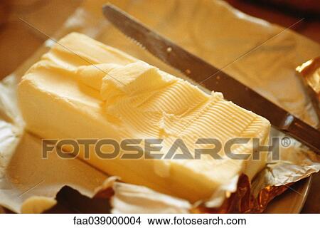 Picture - Butter and knife. Fotosearch