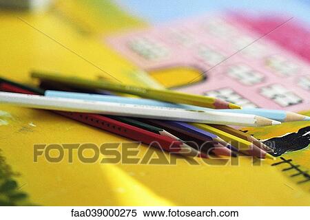 Colored pencils on colorful drawing, close-up View Large Photo Image Stock Photography - Colored pencils on colorful drawing, close-up. Fotosearch