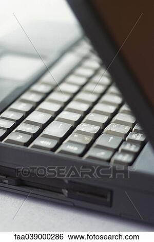 Stock Photograph - Laptop computer, extreme close-up. Fotosearch