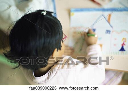 Little girl coloring, high angle view View Large Photo Image Stock Image - Little girl coloring, high angle view. Fotosearch