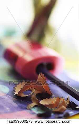 Stock Image - Pencil sharpener, shavings, close-up. Fotosearch
