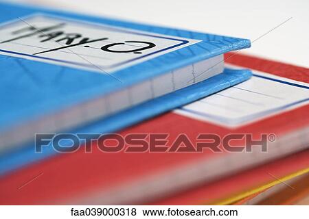 Stock Photo - Pile of school notebooks. Fotosearch