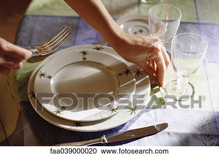 Stock Image - Setting table. Fotosearch