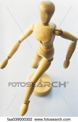 Stock Image - Wooden artist's dummy. Fotosearch
