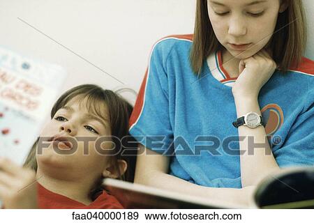 Children reading together View Large Photo Image Stock Photo - Children reading together. Fotosearch
