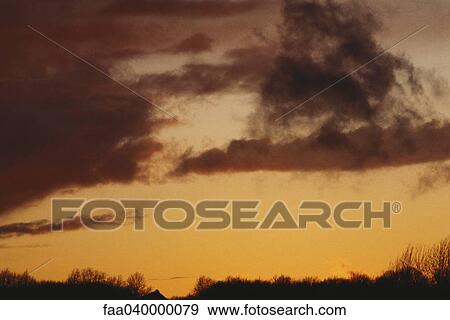 Clouds at sunset View Large Photo Image Stock Photo - Clouds at sunset. Fotosearch