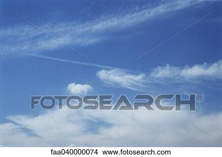 Cloudscape and vapor trail View Large Photo Image Picture - Cloudscape and vapor trail. Fotosearch