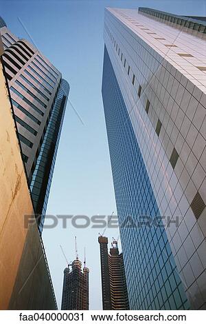 High rise buildings, low angle view View Large Photo Image Stock Image - High rise buildings, low angle view. Fotosearch